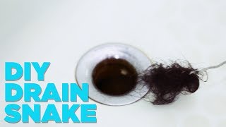 How To Remove Hair From The Drain With A Hanger [upl. by Corina]