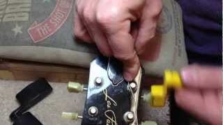 Master Luthiers Guitar String Winding Technique [upl. by Oirobil]