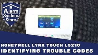 How To Clear Trouble Conditions On Honeywell Lynx L5210  AlarmSystemStore [upl. by Hbaruas462]