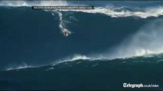 Amazing video of surfer Garrett McNamara riding biggest wave of all time in Portugal [upl. by Radford686]