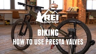 How to Pump Up a Bike Tire With Presta Valves  REI [upl. by Yerxa660]