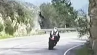 Motorcycle flips over cliff in scary crash caught on tape [upl. by Ahsiat]