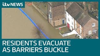 Emergency evacuation as flood barriers overwhelmed  ITV News [upl. by Enecnarf]