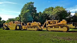 Caterpillar double D9 bulldozer DD9QuadTrac meets Cat motor scraper 1750 horsepower combination [upl. by Dara]